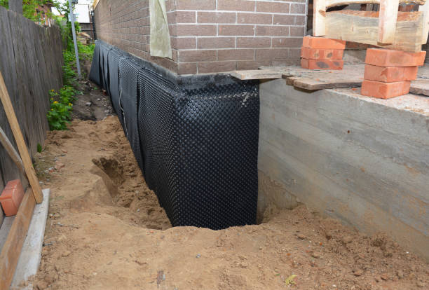 SJ Waterproofing Pros technician performing targeted Waterproofing assessment in Oceanport, NJ